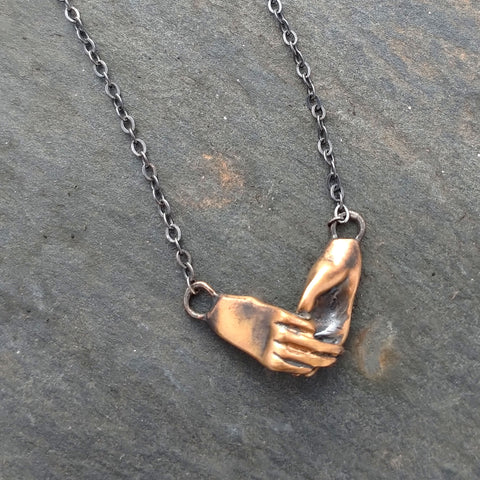 Handmade Bronze Holding Hands Necklace