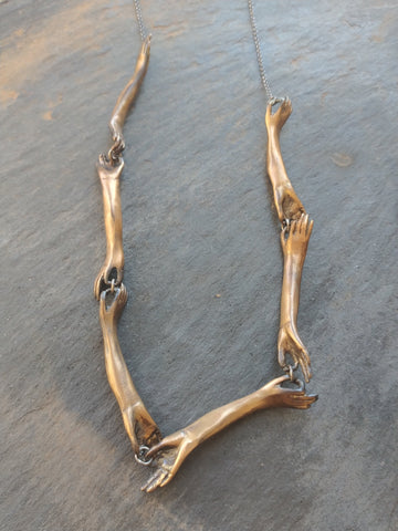 Long Bronze Hands Connecting Necklace