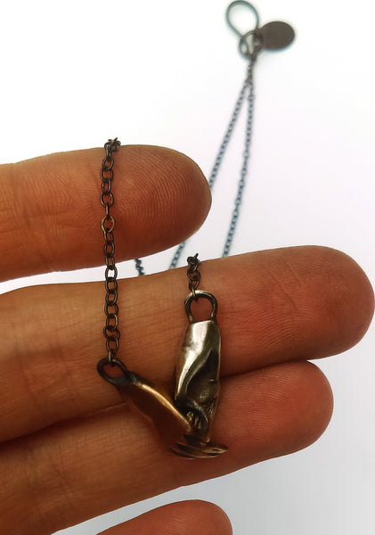 Bronze and Silver Holding Hands Necklace